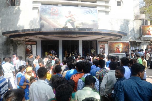 People throng a cinema hall to watch Baahubali 2 in Mumbai, on April 28, 2017. (IANS)