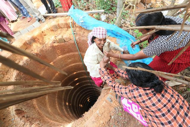 Women of a sleepy village Pookkotukavu in Palakkad district dug 176 wells in six months to fight the drought conditions. (HT Photo) Women of a sleepy village Pookkotukavu in Palakkad district dug 176 wells in six months to fight the drought conditions. (HT Photo)