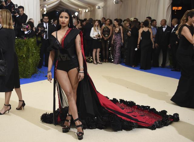Nicki Minaj ’s belt had Rei Kawakubo’s face emblazoned on it. (Evan Agostini/Invision/AP) Nicki Minaj ’s belt had Rei Kawakubo’s face emblazoned on it. (Evan Agostini/Invision/AP)