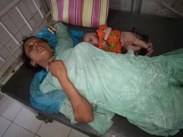 A woman who fainted while waiting in a queue to apply for ration card in Dhandaha undergoing treatment at a health facility in Purnia (Shailendra Sunny, Hindustan Times) A woman who fainted while waiting in a queue to apply for ration card in Dhandaha undergoing treatment at a health facility in Purnia (Shailendra Sunny, Hindustan Times)