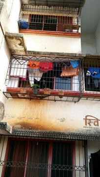 The third floor apartment from where the girl toppled. (HT) The third floor apartment from where the girl toppled. (HT)