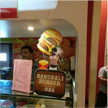 A food chain has a Bahubali burger, with Prabhas carrying it on his shoulders.
