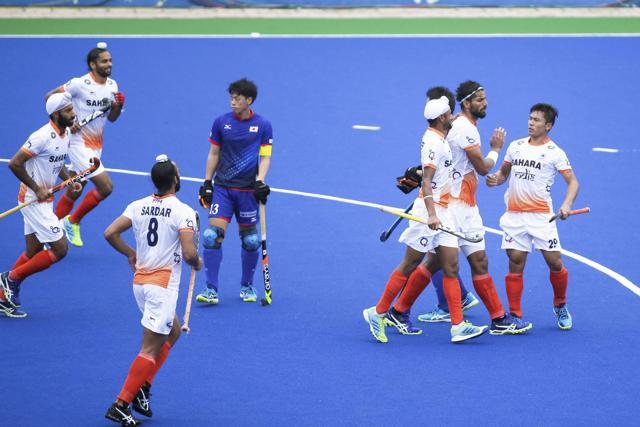 Indian hockey team's Rupinder Pal Singh, second from right, celebrates with teammates after scoring the opening goal against Japan hockey team during their match at the Sultan Azlan Shah Cup tournament in Ipoh, Malaysia, on Wednesday. (AP) Indian hockey team's Rupinder Pal Singh, second from right, celebrates with teammates after scoring the opening goal against Japan hockey team during their match at the Sultan Azlan Shah Cup tournament in Ipoh, Malaysia, on Wednesday. (AP)