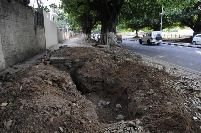 A dug-up cycle track in Sector 20. (Keshav Singh/HT Photo) A dug-up cycle track in Sector 20. (Keshav Singh/HT Photo)
