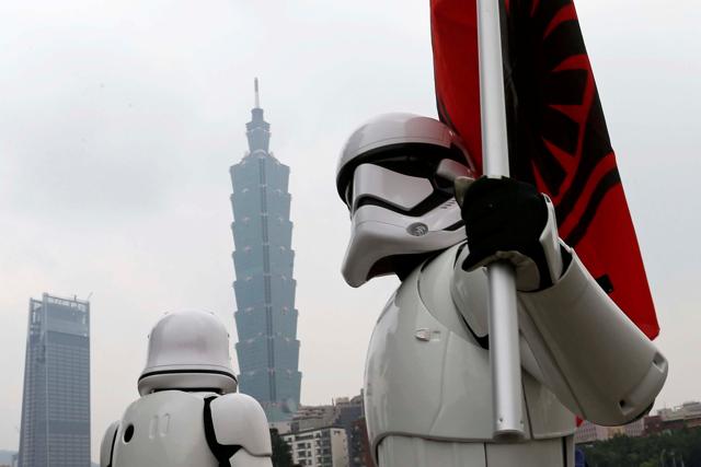 Fans dressed as Storm Trooper from Star Wars pose in front of landmark building Taipei 101 during Star Wars Day in Taipei. (REUTERS) Fans dressed as Storm Trooper from Star Wars pose in front of landmark building Taipei 101 during Star Wars Day in Taipei. (REUTERS)