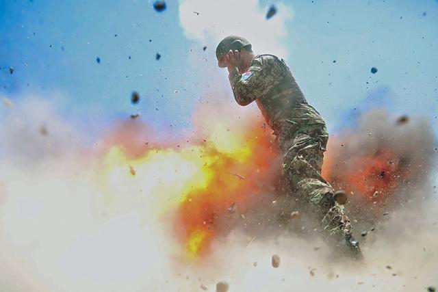 Spc. Hilda I Clayton captured the explosion barely moments after it occurred and moments before it took her life. (US Army/Reuters ) Spc. Hilda I Clayton captured the explosion barely moments after it occurred and moments before it took her life. (US Army/Reuters )