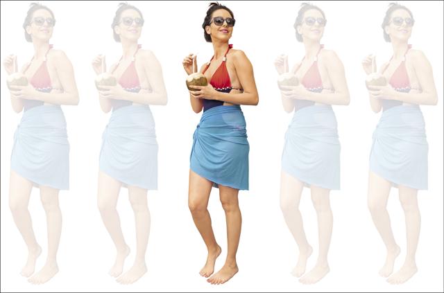 A swimsuit can be worn with a sarong if you’re bottom-heavy but are not afraid to flaunt your curves and arms. On Marija: Swimwear with sarong, Kunchals; Sunglasses, Vogue Eyewear. (Irina Usova) A swimsuit can be worn with a sarong if you’re bottom-heavy but are not afraid to flaunt your curves and arms. On Marija: Swimwear with sarong, Kunchals; Sunglasses, Vogue Eyewear. (Irina Usova)