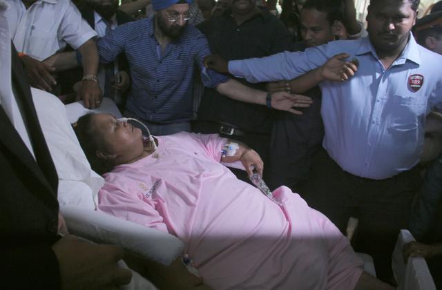 Staff makes way for Eman. (Bhushan Koyande)