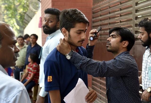 Students undergo checks before the NEET at Kerala School in New Delhi on Sunday. (Sushil Kumar/HT Photo) Students undergo checks before the NEET at Kerala School in New Delhi on Sunday. (Sushil Kumar/HT Photo)