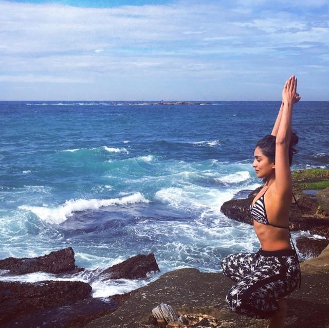 Pallavi doing Yoga at the Coogee beach.