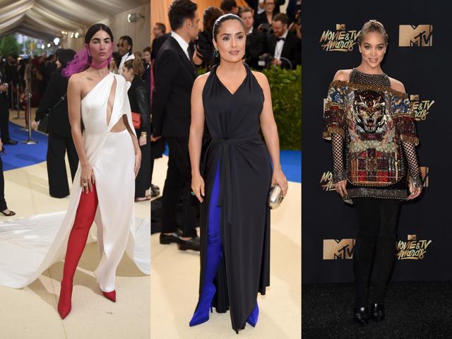 Model Lily Aldridge, actor Salma Hayek and Jasmine Sanders in waist-high boots. Model Lily Aldridge, actor Salma Hayek and Jasmine Sanders in waist-high boots.