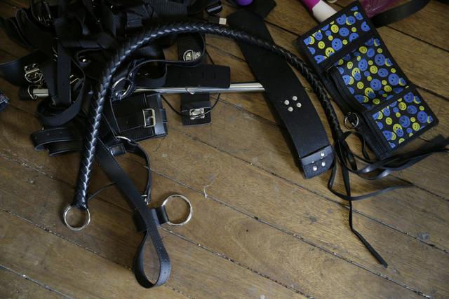 In this April 20, 2017, photo, sex toys are seen on the floor of the home of suspected child webcam cybersex operator, David Timothy Deakin. (AP) In this April 20, 2017, photo, sex toys are seen on the floor of the home of suspected child webcam cybersex operator, David Timothy Deakin. (AP)