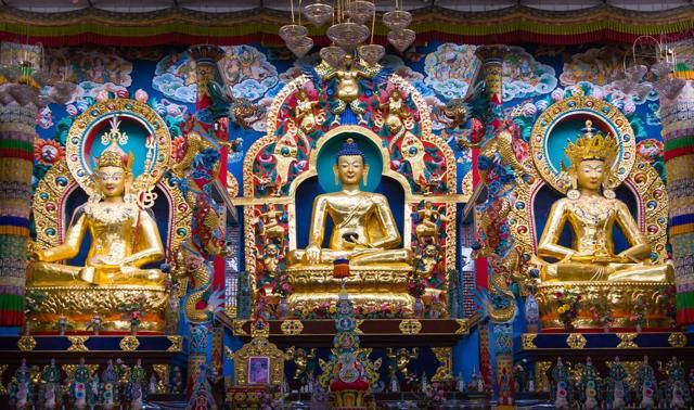 A monastery altar with deities of Padmasambhava, Buddha and Maitreya. (Shutterstock) A monastery altar with deities of Padmasambhava, Buddha and Maitreya. (Shutterstock)