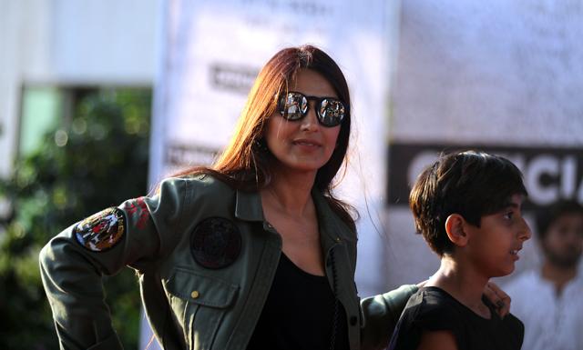 Sonali Bendre arrives to attend the concert with her son. (AFP) Sonali Bendre arrives to attend the concert with her son. (AFP)