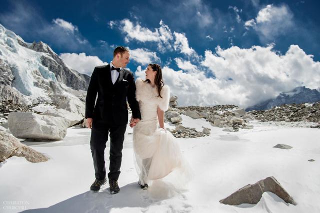 Walking on the snow in their wedding attire. (Photos: Charleton Churchill)