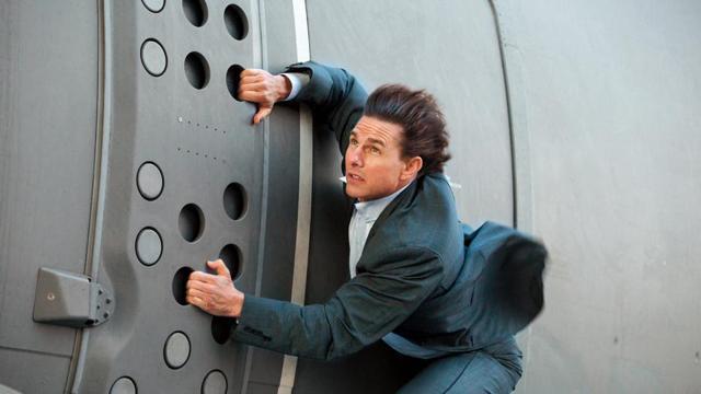 Actor Tom Cruise in a Mission Impossible action sequence. Actor Tom Cruise in a Mission Impossible action sequence.