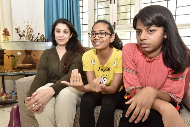 Akriti (centre) and Parul (right) with Venus, owner of lost dog Rexy, on Wednesday. The Australian couple, Venus and Rick, had announced Rs 2 lakh reward on social media for finding the dog. (Sanjeev Verma/HT Photo) Akriti (centre) and Parul (right) with Venus, owner of lost dog Rexy, on Wednesday. The Australian couple, Venus and Rick, had announced Rs 2 lakh reward on social media for finding the dog. (Sanjeev Verma/HT Photo)