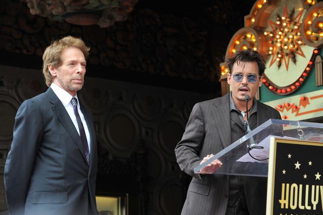 Producer Jerry Bruckheimer (L) and Johnny Depp. (Shutterstock.) Producer Jerry Bruckheimer (L) and Johnny Depp. (Shutterstock.)