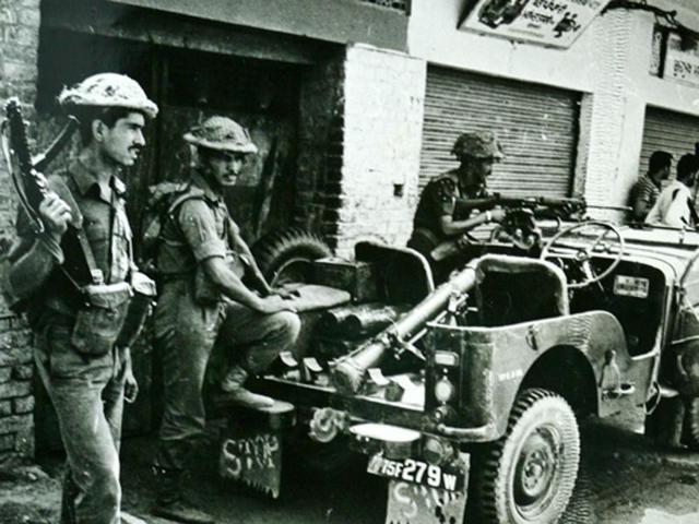 Soldiers take positions outside the premises of the Golden Temple in Amritsar during the operation in 1984. (India Today Group/Getty Images) Soldiers take positions outside the premises of the Golden Temple in Amritsar during the operation in 1984. (India Today Group/Getty Images)