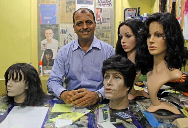 Pankaj Bhupatkar runs a wig-making company called Rajkamal Wigs &amp; Hair and also works with NGO Madat Charitable Trust, making wigs for free out of donated hair. (Satyabrata Tripathy / HT Photo)