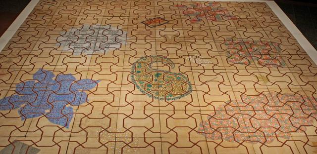 A gigantic installation, an arrangement of papier-mâché tiles, depicts patterns typical of Kashmiri craftsmen. (Satyabrata Tripathy/ HT Photo)