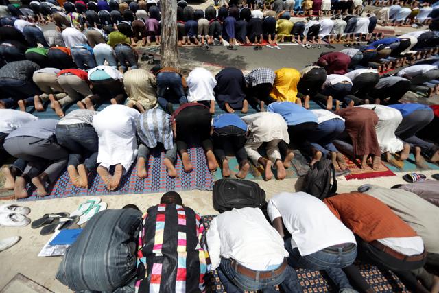 Students pray outside the Grand Mosque de lÕVead, a Salafist mosque of the Anta Diop University in Dakar. (Reuters) Students pray outside the Grand Mosque de lÕVead, a Salafist mosque of the Anta Diop University in Dakar. (Reuters)