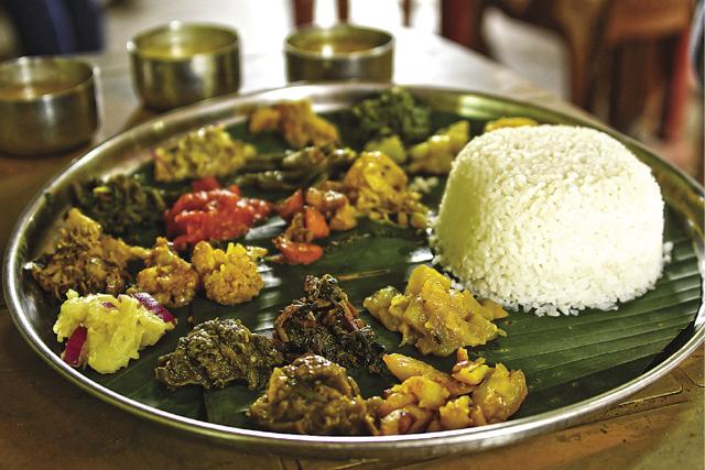 A lip-smacking Assamese thali. (Saubhadra Chatterji) A lip-smacking Assamese thali. (Saubhadra Chatterji)