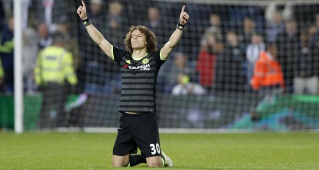 Chelsea's David Luiz celebrates winning the Premier League title after the match against West Brom on Friday. (REUTERS) Chelsea's David Luiz celebrates winning the Premier League title after the match against West Brom on Friday. (REUTERS)