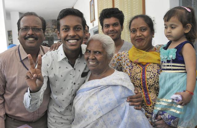 Shivam Kumar of RS Model Senior Secondary School Shastri Nagar, who secured rank three in the sports category, celebrating is success with his parents and grandmother in Ludhiana on Saturday, May 13, 2017. (Gurminder Singh /Hindustan Times) Shivam Kumar of RS Model Senior Secondary School Shastri Nagar, who secured rank three in the sports category, celebrating is success with his parents and grandmother in Ludhiana on Saturday, May 13, 2017. (Gurminder Singh /Hindustan Times)