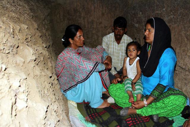 Border residents take shelter in a bunker after Pakistani troops shelled at Nowshera sector of Rajouri district on Saturday. (PTI) Border residents take shelter in a bunker after Pakistani troops shelled at Nowshera sector of Rajouri district on Saturday. (PTI)