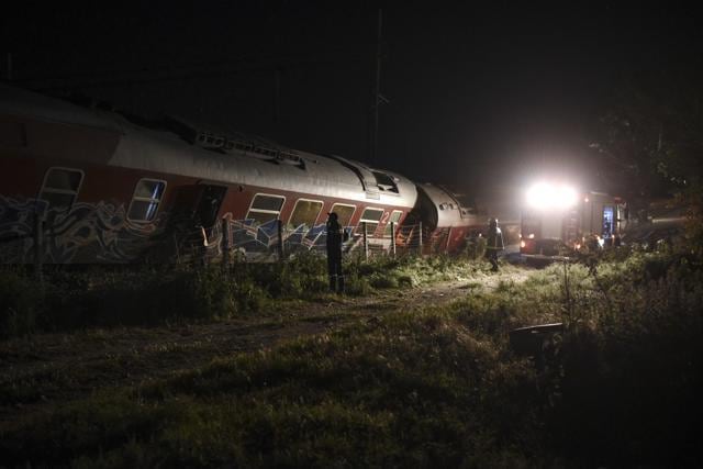 Rescuers search the site of a fatal train derailment close to the northern city of Thessaloniki, Greece. (AP Photo)
