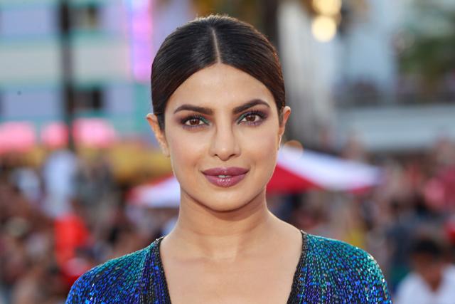 Cast member Priyanka Chopra poses at the premiere of the film Baywatch in Miami Beach. (REUTERS)