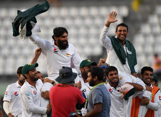 Retiring Pakistan cricket team members captain Misbah-ul-Haq (L) and Younis Khan (R) are carried by teammates as they celebrate after winning the final Test match and the series 2-1 against the West Indies at the Windsor Park Stadium in Roseau, Dominica on Sunday. (AFP) Retiring Pakistan cricket team members captain Misbah-ul-Haq (L) and Younis Khan (R) are carried by teammates as they celebrate after winning the final Test match and the series 2-1 against the West Indies at the Windsor Park Stadium in Roseau, Dominica on Sunday. (AFP)