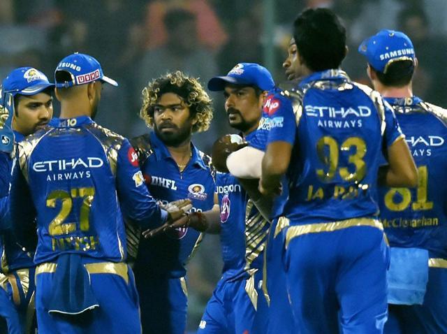 Mumbai Indians bowler Lasith Malinga celebrates with team mates after taking a wicket against Delhi Daredevils. (PTI) Mumbai Indians bowler Lasith Malinga celebrates with team mates after taking a wicket against Delhi Daredevils. (PTI)