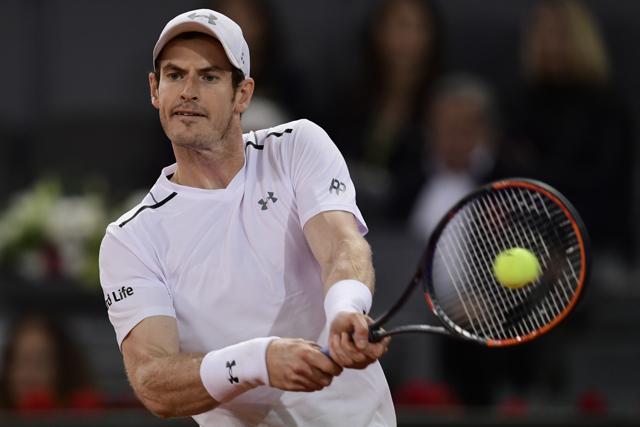 Andy Murray returns a ball to Croatian tennis player Borna Coric at the ATP Madrid Open. (AFP) Andy Murray returns a ball to Croatian tennis player Borna Coric at the ATP Madrid Open. (AFP)