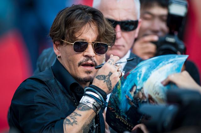 Actor Johnny Depp arrives for the world premiere of Disney movie Pirates of the Caribbean: Dead Men Tell No Tales in Shanghai. (AFP)