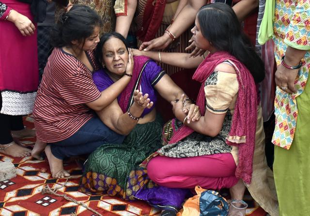 The mother and relatives of Garima Gupta at her residence in west Delhi’s Inderpuri on Tuesday. (Sushil Kumar/HT PHOTO) The mother and relatives of Garima Gupta at her residence in west Delhi’s Inderpuri on Tuesday. (Sushil Kumar/HT PHOTO)
