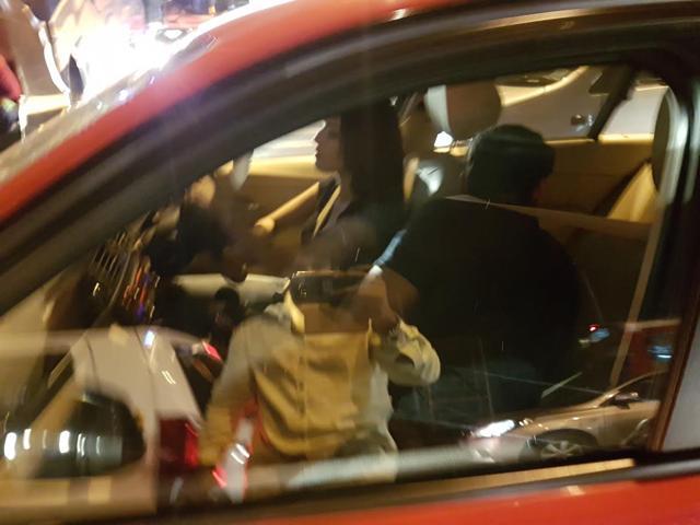 A picture of the cricketer as he drove out of the restaurant along with the actor.