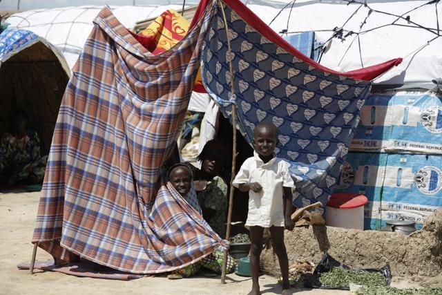 File photo from August 2016 shows a child playing in a makeshift tent camp for people displaced by Islamist extremists in Maiduguri, Nigeria. (AP) File photo from August 2016 shows a child playing in a makeshift tent camp for people displaced by Islamist extremists in Maiduguri, Nigeria. (AP)