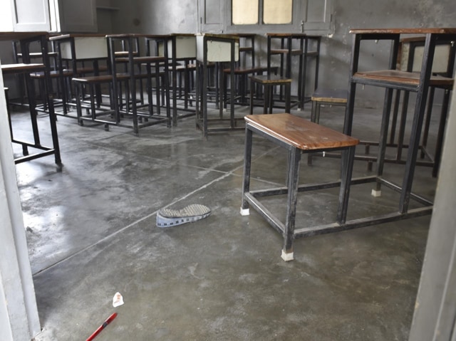 A shoe of Simran lies on the classroom floor where she committed suicide. (Gurpreet Singh/HT Photo) A shoe of Simran lies on the classroom floor where she committed suicide. (Gurpreet Singh/HT Photo)