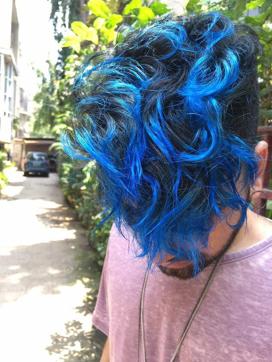 Anil Masand, 30, a human resources professional, flaunting his new blue glow.
