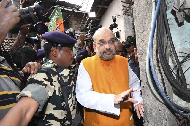 BJP president Amit Shah at a slum in Bhawanaipore which is Mamata Banerjee’s Assembly constituency. She has identified BJP as her chief opponent. (Samir Jana/HT PHOTO) BJP president Amit Shah at a slum in Bhawanaipore which is Mamata Banerjee’s Assembly constituency. She has identified BJP as her chief opponent. (Samir Jana/HT PHOTO)