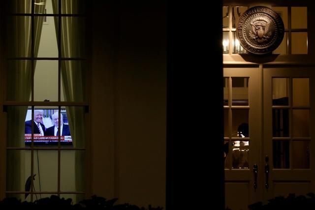 A television plays a news report on US President Donald Trump's recent Oval Office meeting with Russia's ambassador to the US. (Reuters File Photo) A television plays a news report on US President Donald Trump's recent Oval Office meeting with Russia's ambassador to the US. (Reuters File Photo)