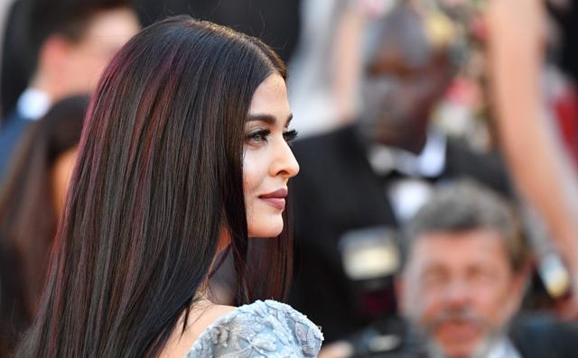 Aishwarya flaunted beautiful shared of red in her hair. (AFP)