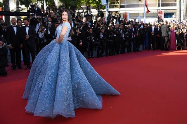 Aishwarya Rai Bachchan poses as she arrives on May 19, 2017 for the screening of the film Okja at the 70th edition of the Cannes Film Festival in Cannes, France. (AFP) Aishwarya Rai Bachchan poses as she arrives on May 19, 2017 for the screening of the film Okja at the 70th edition of the Cannes Film Festival in Cannes, France. (AFP)