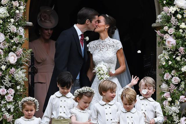 Pippa Middleton kisses her new husband James Matthews, following their wedding ceremony. (AFP Photo) Pippa Middleton kisses her new husband James Matthews, following their wedding ceremony. (AFP Photo)