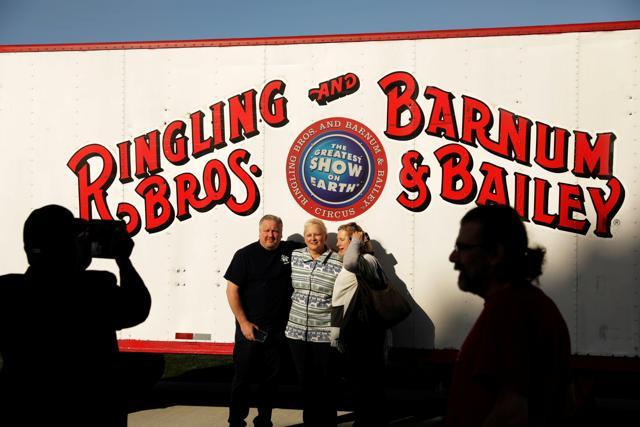 People pose for pictures in front of a trailer after watching a show on the last day of the Ringling Bros. and Barnum & Bailey circus at Nassau Coliseum in Uniondale. (Reuters Photo) People pose for pictures in front of a trailer after watching a show on the last day of the Ringling Bros. and Barnum & Bailey circus at Nassau Coliseum in Uniondale. (Reuters Photo)