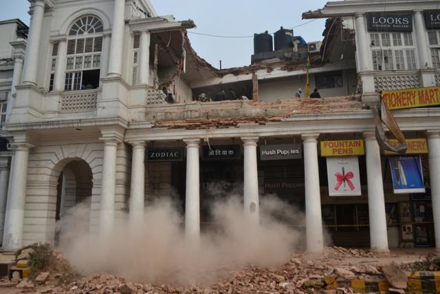Workers clearing the debris of the portion that collapsed, in C block of Connaught Place. (Zuhaib Mohammad/ HT Photo) Workers clearing the debris of the portion that collapsed, in C block of Connaught Place. (Zuhaib Mohammad/ HT Photo)