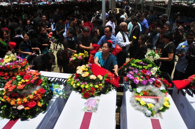 Floral tributes offered to the eight people killed in the violence in 2015. (HT Photo)