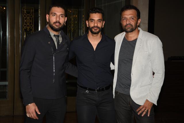Cricketer Yuvraj Singh, actor Angad Bedi and photographer Atul Kasbekar. (Prodip Guha/HT Photo)